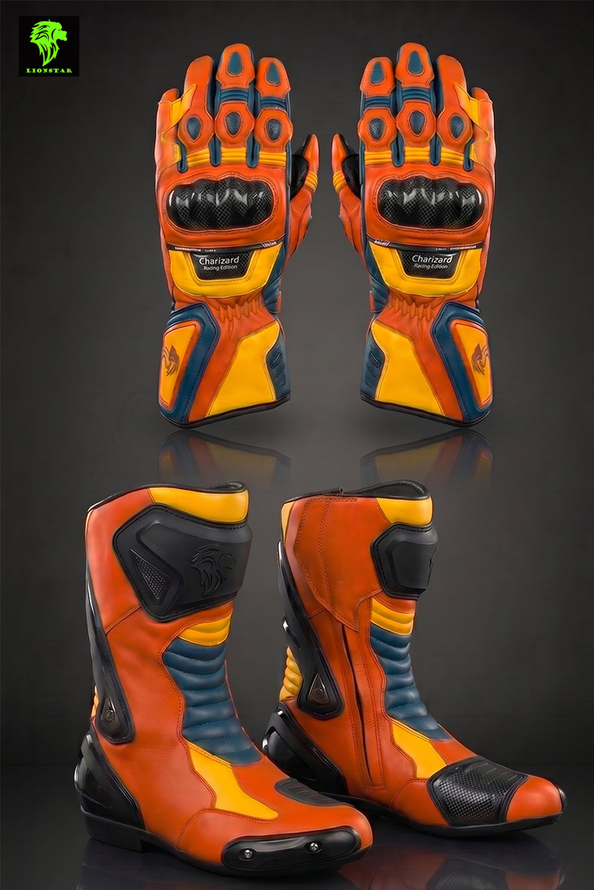 Pair of orange and black motorcycle gloves and boots on a reflective surface with a dark background.